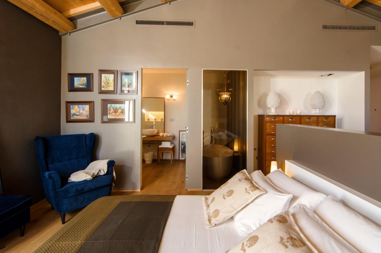 Casavostra - Ambience Suites Ostra Vetere Luaran gambar